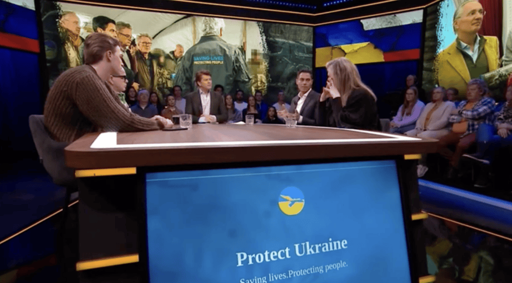 Protect Ukraine representatives discussing their mission on the national TV talk show 'BEAU Op Zondag'.