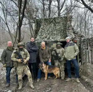 Authors Jaap Scholten, Tommy Wieringa and Maurits Chabot during a Protect Ukraine frontline convoy.
