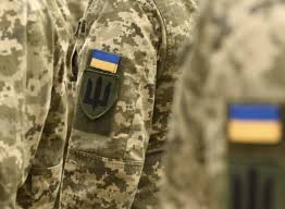 Close-up of a Ukrainian soldier in uniform at a Protect Ukraine supported veteran rehabilitation centre.